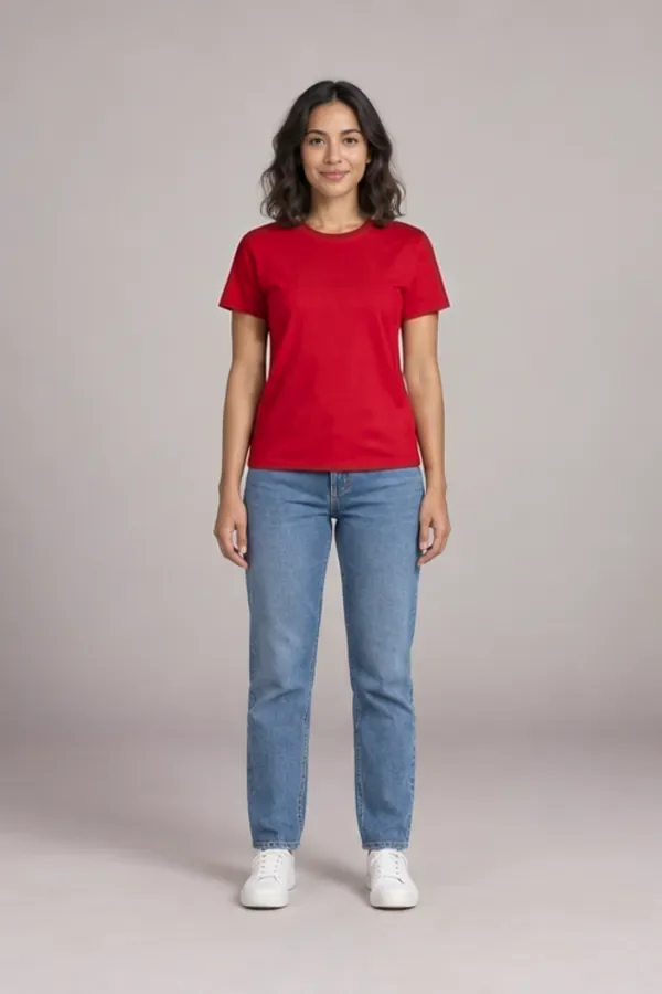Ava in a red crew-neck T-shirt and the same light blue jeans